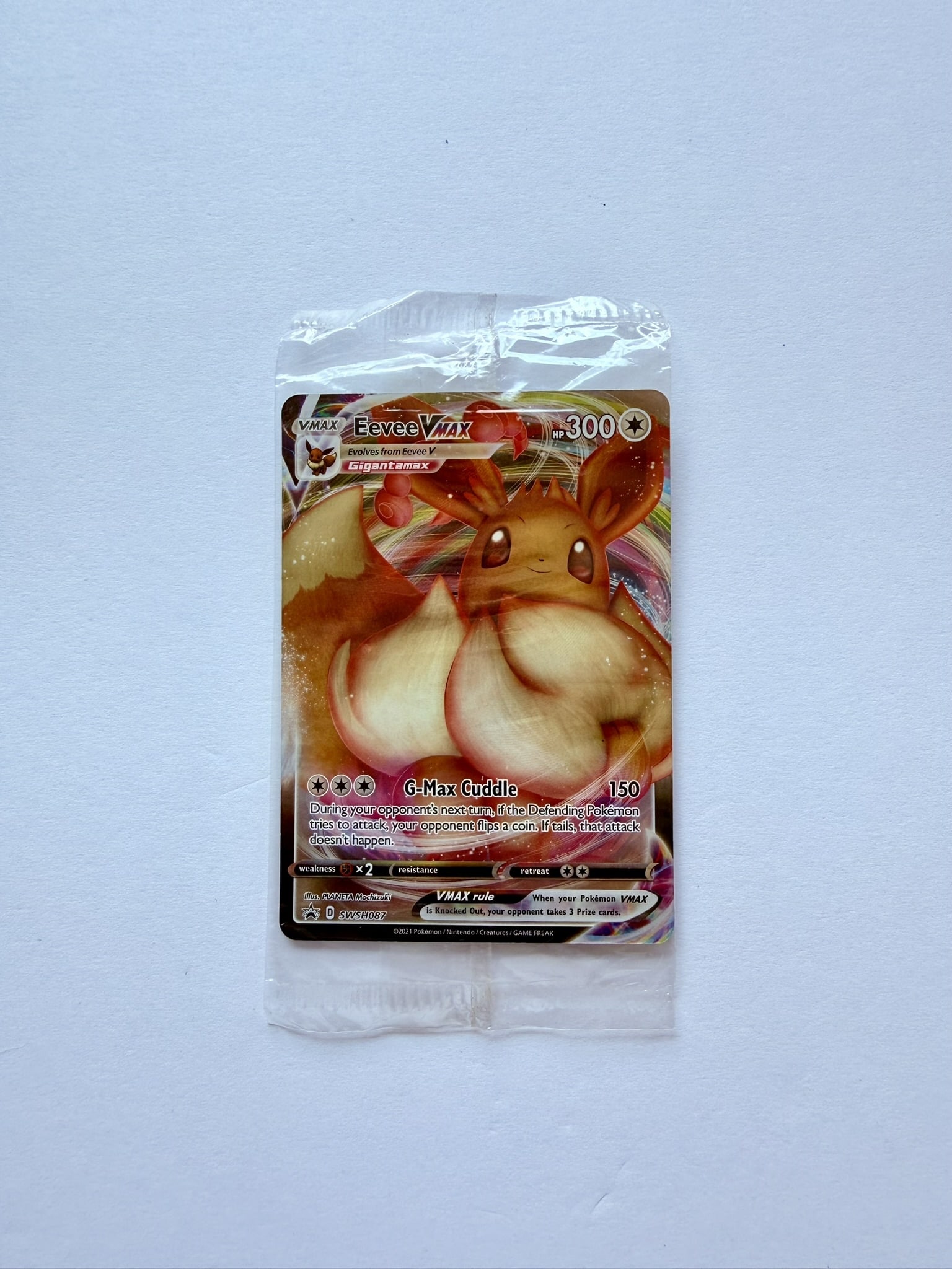 Eevee VMAX - SWSH087 - SWSH: Sword & Shield Promo Cards (SWSD): This card is the only version of Eevee VMAX, and was released as a promo card with the Shining Fates Elite Trainer Box in 2021. It's also the only Pokémon card that depicts Gigantimax Eevee, the fluf
