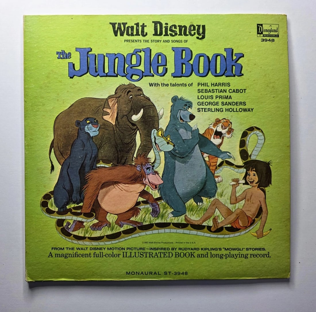 Vintage Walt Disney’s The Jungle Book Disneyland Record ST-3948: Vintage Disneyland Records The Jungle Book illustrated book and long-playing record. Features characters from the classic Disney film.