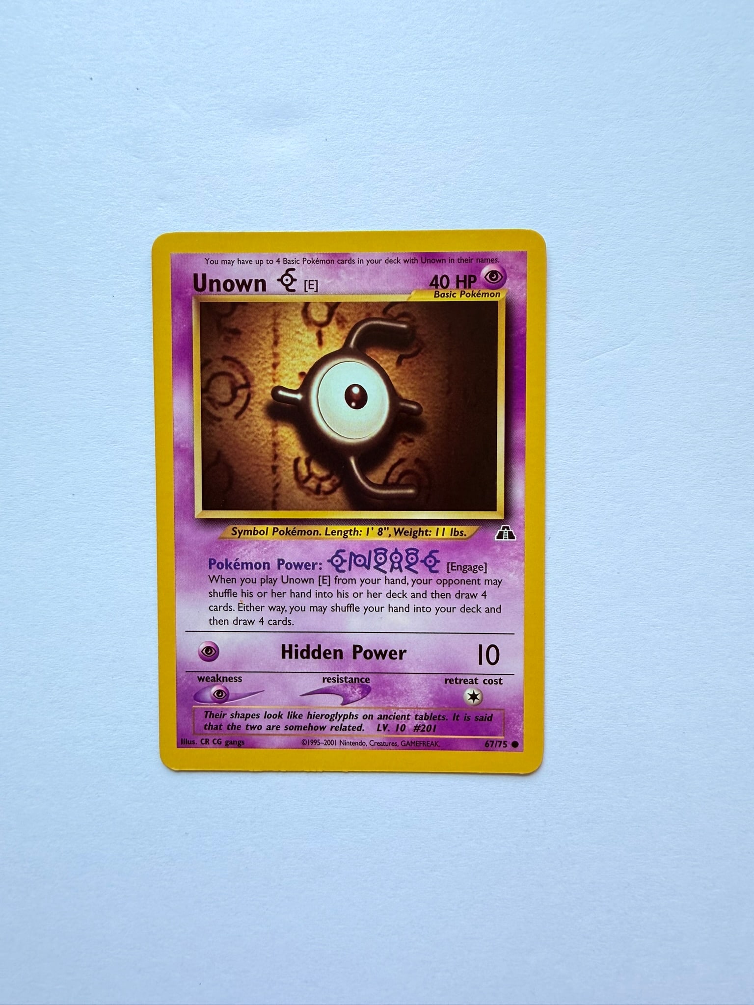 Pokemon Unown E 67/75 Neo Discovery Vintage WOTC Card: Vintage Pokémon Unown [E] from the Neo Discovery set released during the Wizards of the Coast era.