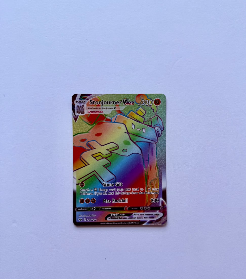 Stonjourner VMAX Rainbow Rare 205/202 Pokemon Card: Stonjourner VMAX Rainbow Rare 205/202 Pokémon card. Card is in Near Mint condition. Please see photos for overall condition before bidding.