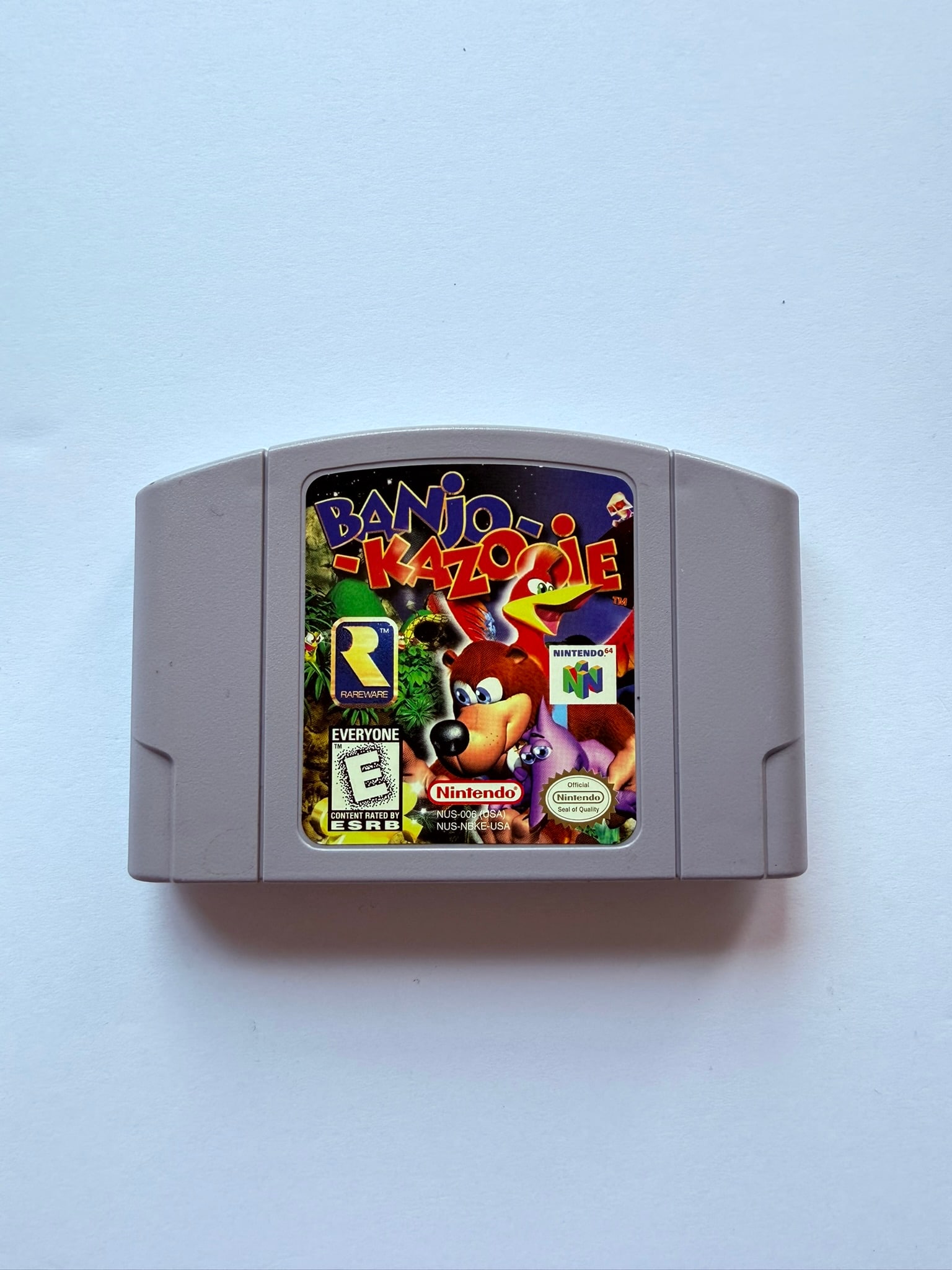Nintendo 64 Banjo-Kazooie Game Cartridge: Authentic Nintendo 64 Banjo-Kazooie cartridge developed by Rare. Classic platforming adventure game and one of the most beloved titles on the N64 console.