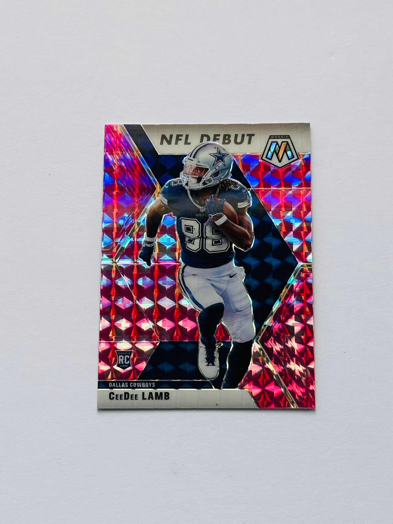 2020 Panini Mosaic NFL Debut Pink Camo Mosaic CeeDee Lamb RC #268 Dallas Cowboys Rookie Card (1 of 2)