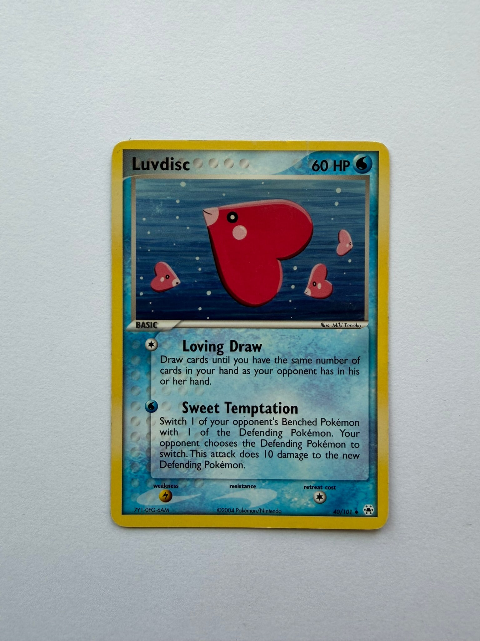 2004 Pokemon Luvdisc 40/101 Hidden Legends: Luvdisc 40/101 reverse-holo card from the 2004 EX Hidden Legends expansion. Features Miki Tanaka artwork and the distinctive stamped reverse-holographic pattern. Ungraded with visible edge and surface