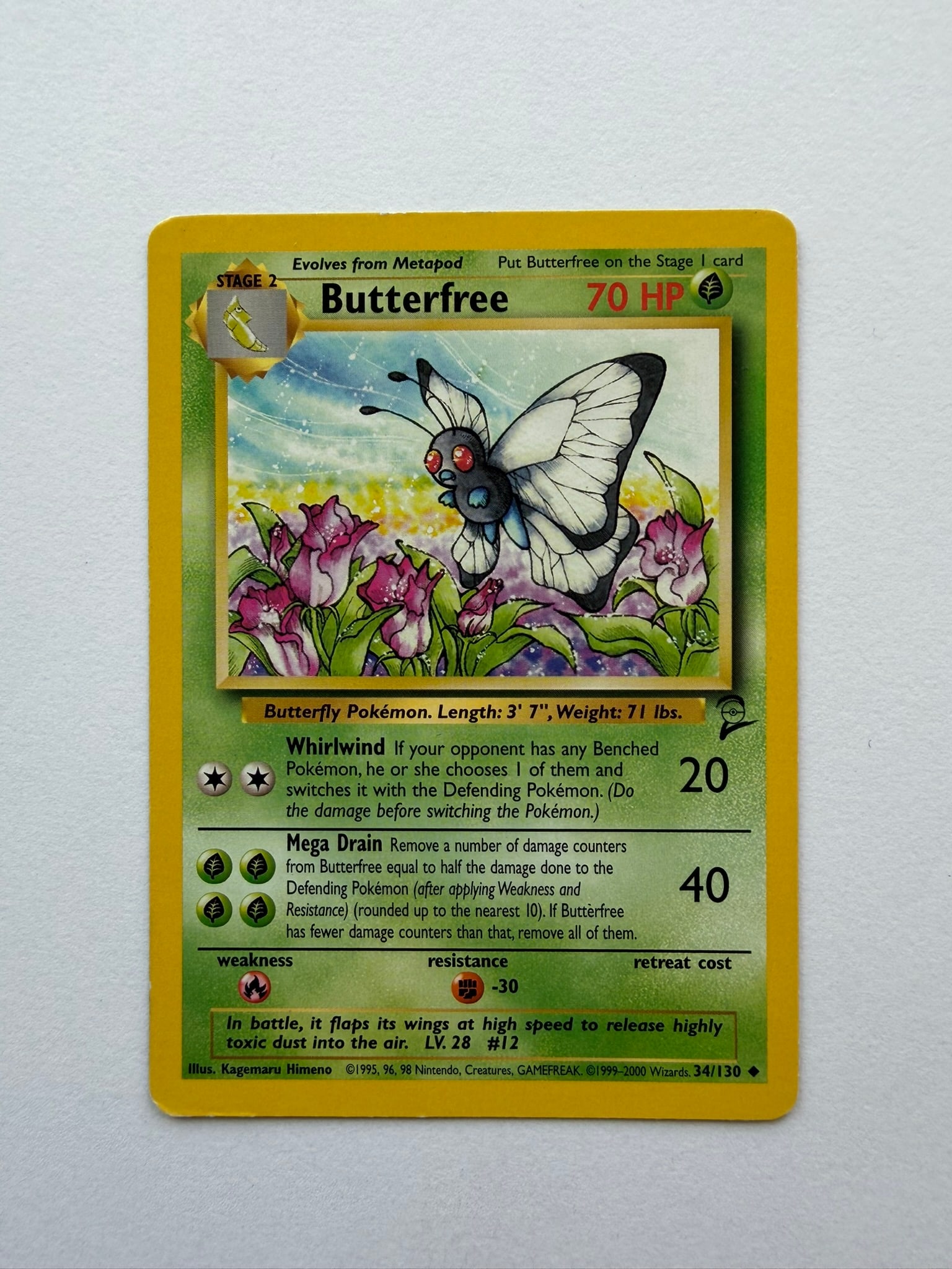 2000 Pokemon Butterfree 34/130 Base Set 2: Vintage Butterfree 34/130 from the 2000 Pokemon Base Set 2 expansion. Unlimited non-holo card featuring Kagemaru Himeno artwork. Ungraded with visible age-related wear. Please review photographs for c