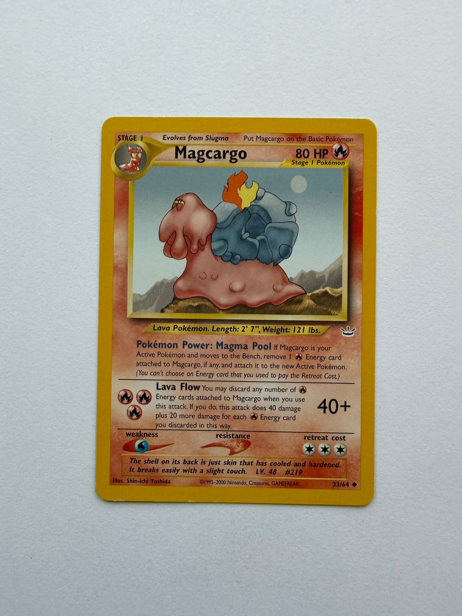 2001 Pokemon Magcargo 33/64 Neo Revelation: Vintage Magcargo 33/64 from the 2001 Pokemon Neo Revelation expansion. Unlimited non-holo uncommon featuring artwork by Shin-ichi Yoshida. Ungraded with visible edge and surface wear. Please review ph