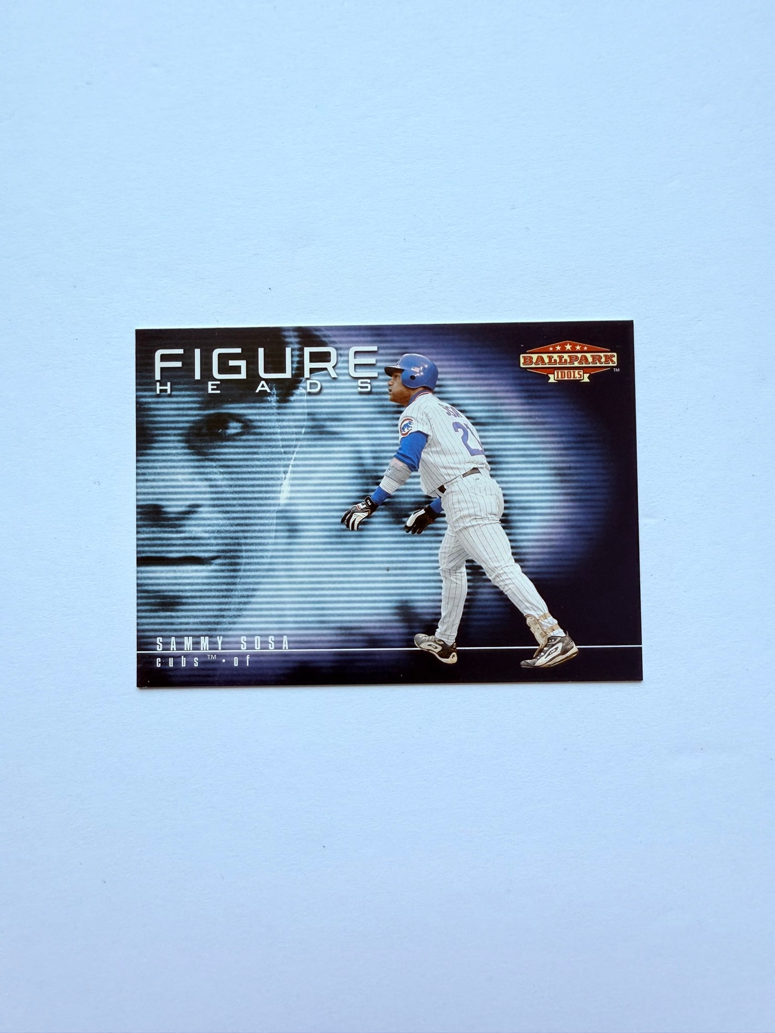 2002 Upper Deck Ballpark Idols Figure Heads Sammy Sosa #F2 Chicago Cubs Insert: Sammy Sosa Figure Heads insert from 2002 Upper Deck Ballpark Idols. Unique design featuring the Cubs slugger and home run king during the peak of his Chicago career. Popular insert for Sosa and Cubs c