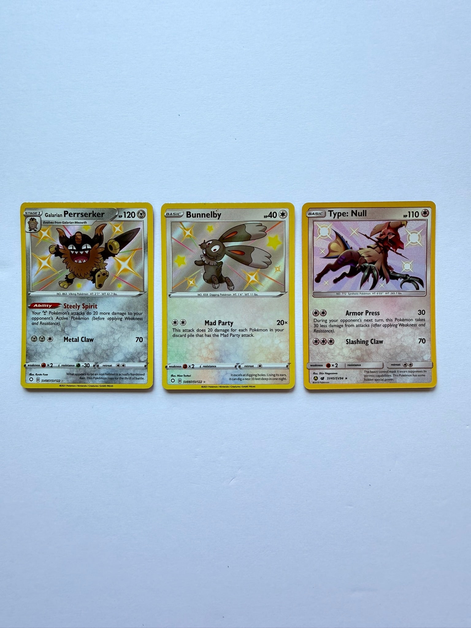 Pokemon Shiny Card Lot Galarian Perrserker Bunnelby Type Null SV: Pokémon shiny card lot featuring Galarian Perrserker, Bunnelby, and Type: Null shiny vault cards.