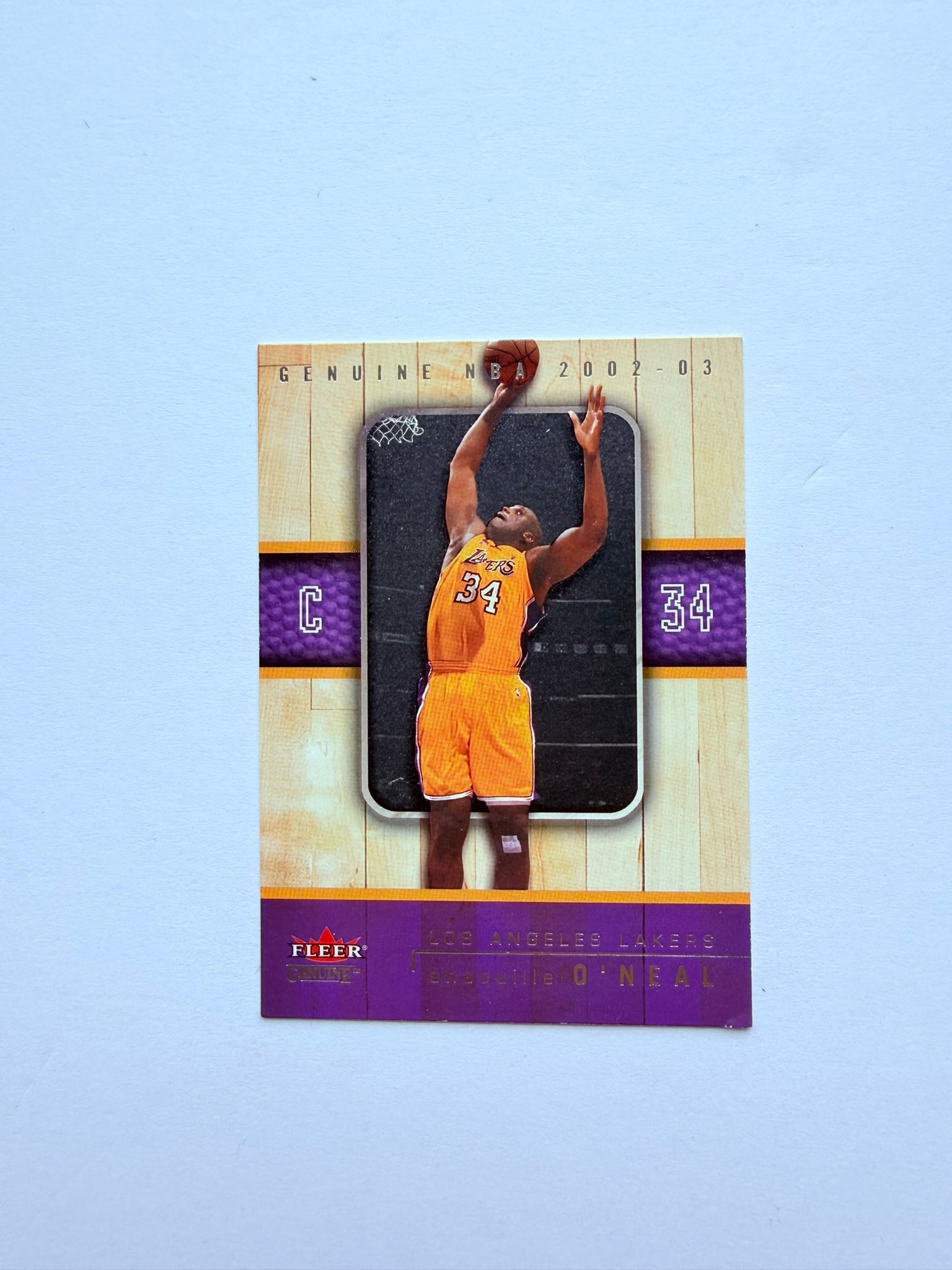 2002-03 Fleer Genuine #1 Shaquille O'Neal Los Angeles Lakers NBA Basketball Card: Genuine 2002-03 Fleer Genuine #1 Shaquille O'Neal card showcasing one of the most dominant centers in NBA history. Excellent addition for Lakers collectors, Shaq fans, and vintage basketball card coll