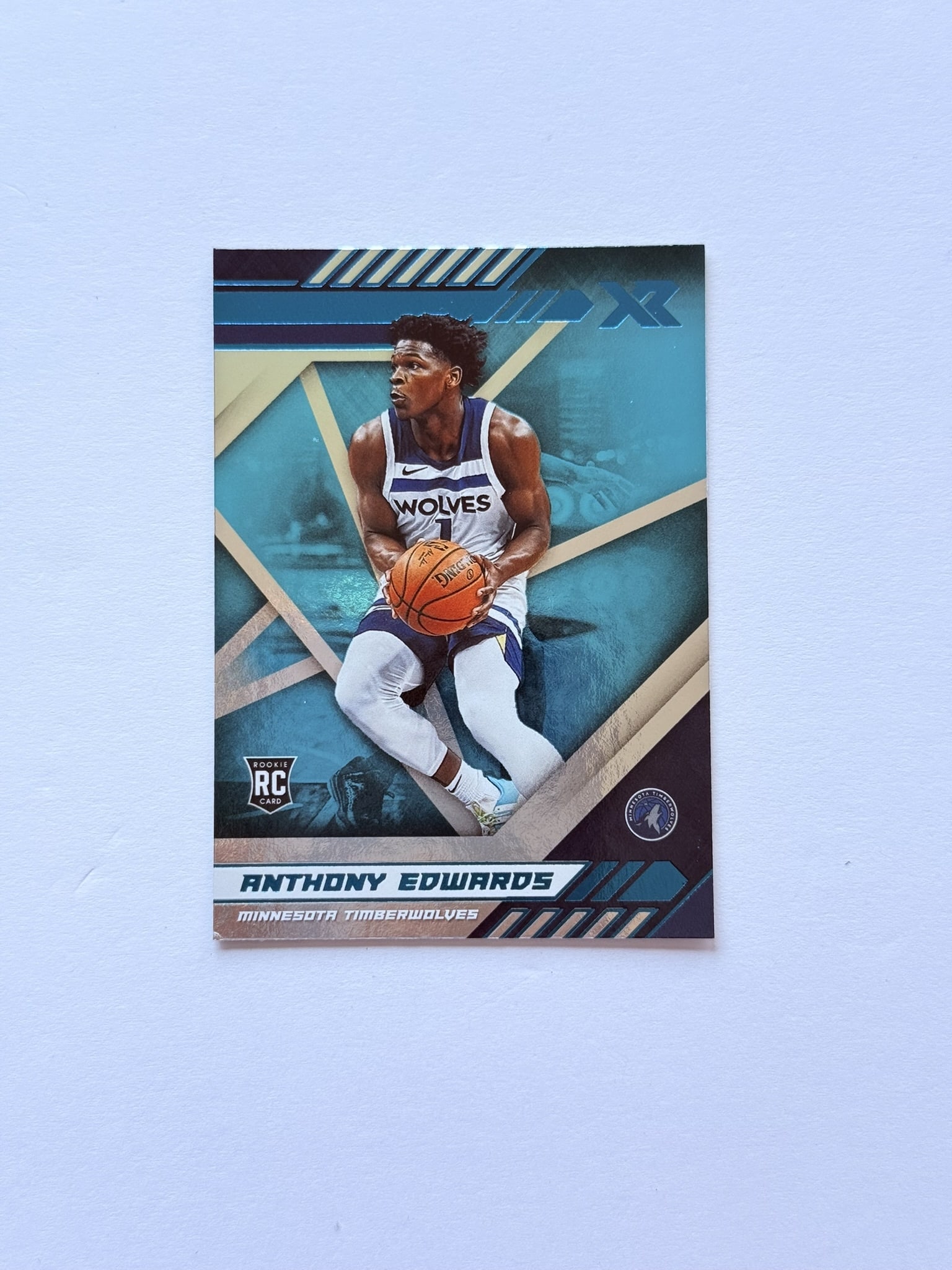 Anthony Edwards XR Rookie Card RC Timberwolves: Anthony Edwards XR rookie card featuring the Minnesota Timberwolves star during his rookie season. Clean modern design with rookie card logo. Great collectible for Anthony Edwards and NBA investors.