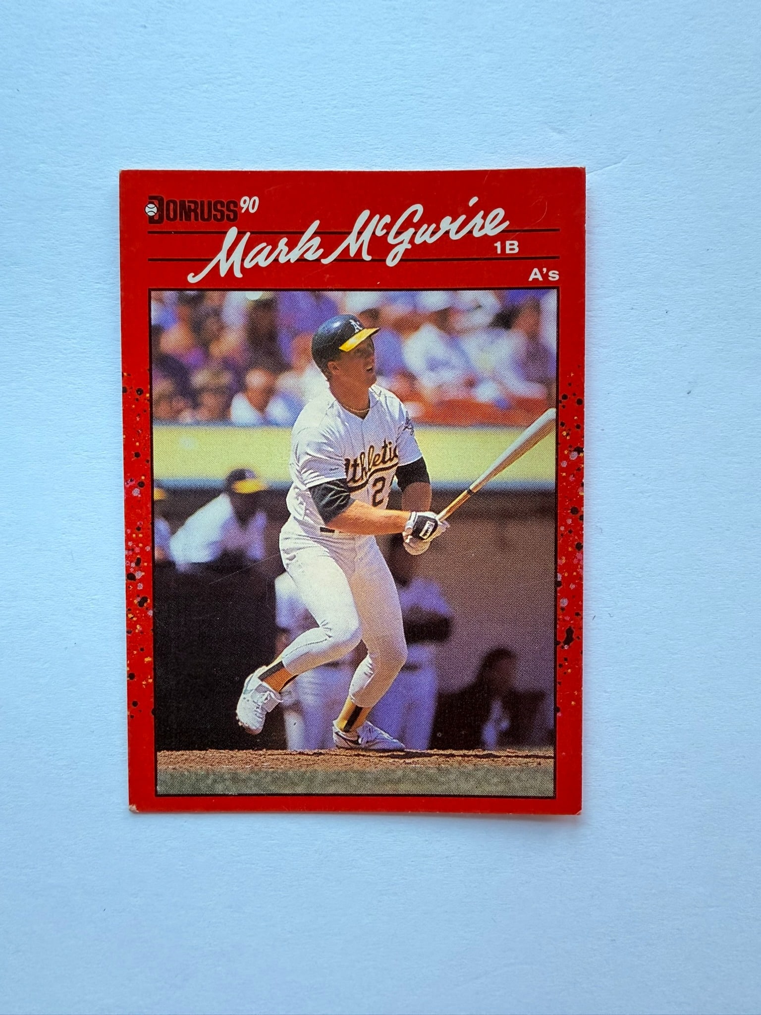 1990 Donruss Mark McGwire Blackout Error Card #185: 1990 Donruss Mark McGwire #185 error variation card. This example appears to feature the popular “Blackout Error” printing variation with missing period after “INC” on reverse copyrigh