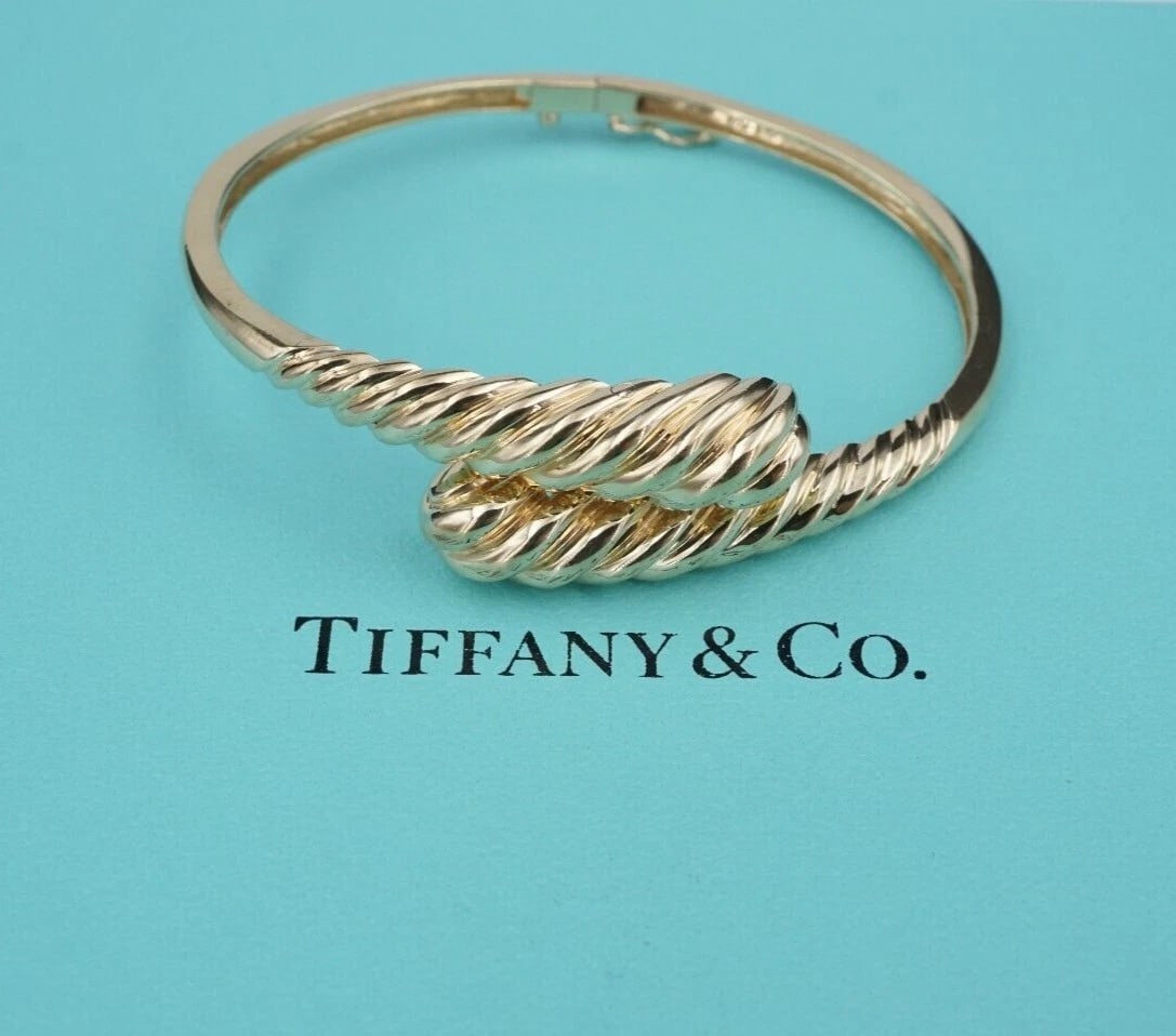 Tiffany & Co. Vintage 14K Yellow Gold Serpent Link Bracelet 7 in 22.2g: Tiffany & Co. Vintage 14K Yellow Gold Serpent Link Bracelet 7 in 22.2g. Vintage estate jewelry with the metal, style, length, and weight represented according to the listing. Please review photographs