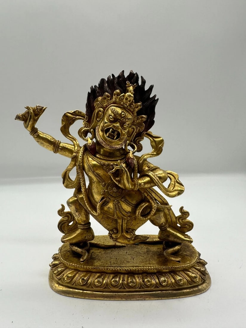 Qing Dynasty Tibetan Gilt-Bronze Buddha Statue: A Qing Dynasty Tibetan gilt-bronze Buddha seated in a meditative posture. The figure is finely modeled with layered robes, ritual hand gestures, and a composed devotional expression. Measures approxim