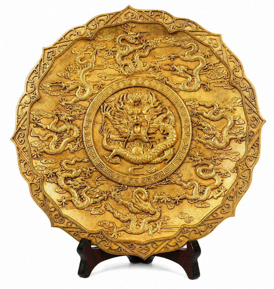 Qianlong-Style Gilt Copper Nine-Dragon Plate: Qianlong-Style Gilt Copper Nine-Dragon Plate. This finely crafted Chinese decorative work features traditional motifs and detailed handwork in Copper Origin: China. The composition reflects the symbol