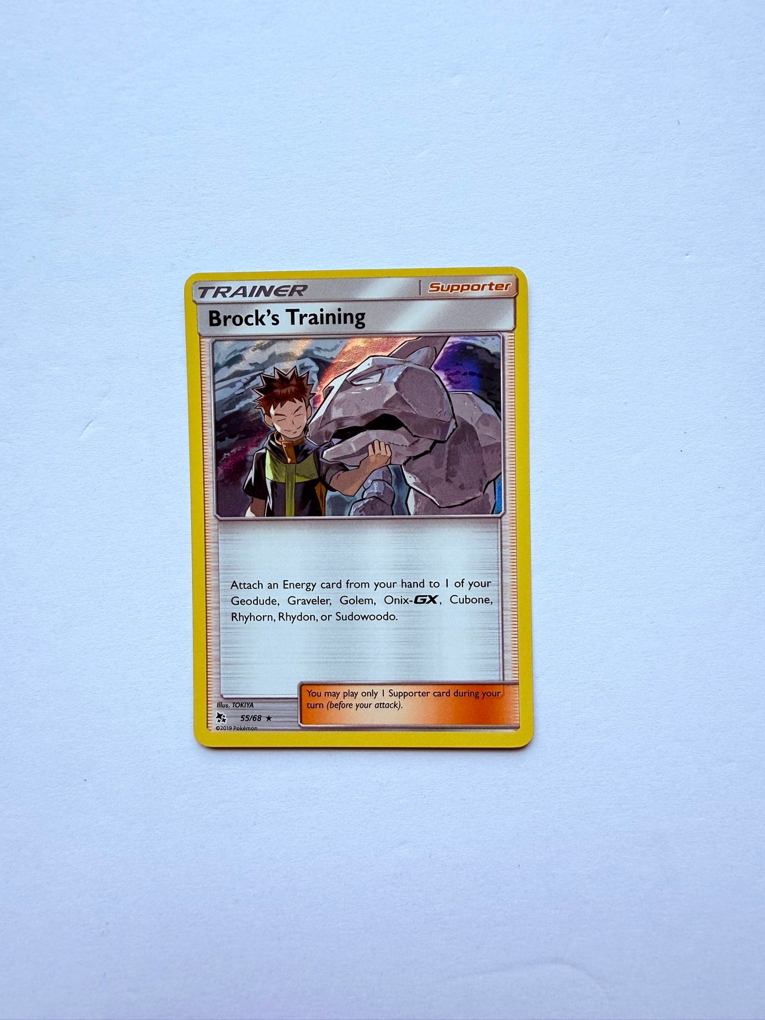Pokémon TCG Brock's Training 55/68 Hidden Fates Trainer Supporter Card NM: Pokémon TCG Brock's Training 55/68 Trainer Supporter card from the Hidden Fates expansion. Features Brock alongside Onix artwork. Great addition for Hidden Fates collectors, Trainer card enthusiasts,
