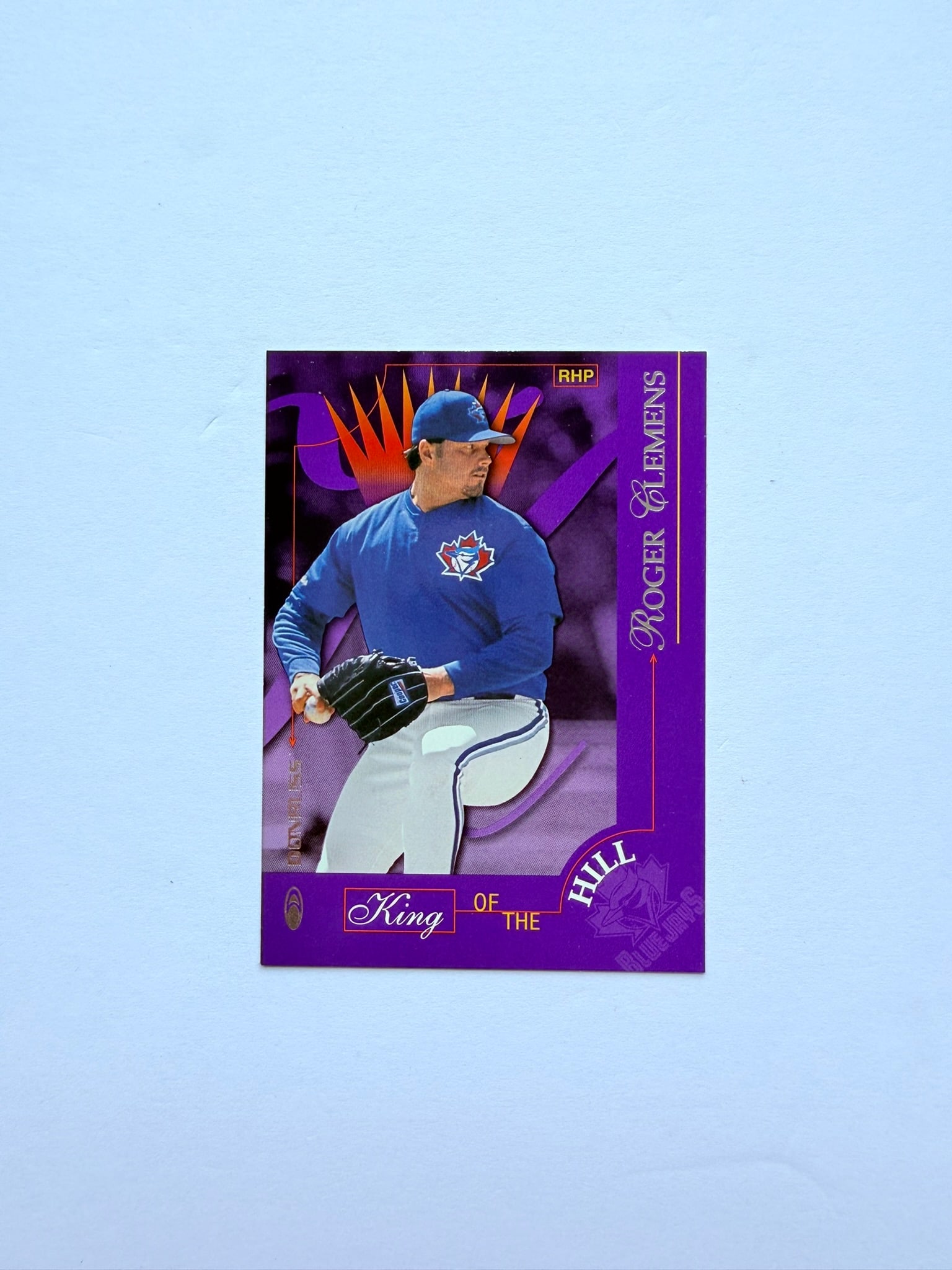 1997 Donruss Preferred Roger Clemens King of the Hill #428 Toronto Blue Jays MLB Card: 1997 Donruss Preferred Roger Clemens King of the Hill #428 featuring the Hall of Fame pitcher during his Toronto Blue Jays tenure. Premium insert card with vibrant purple design, great addition for Bl