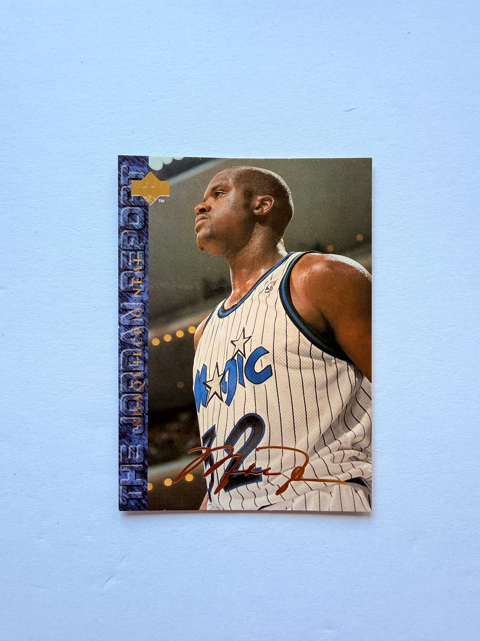 Shaquille O’Neal Orlando Magic Upper Deck Card: Shaquille O’Neal Upper Deck card from his Orlando Magic era featuring facsimile signature styling. Classic early-career Shaq collectible with strong eye appeal.