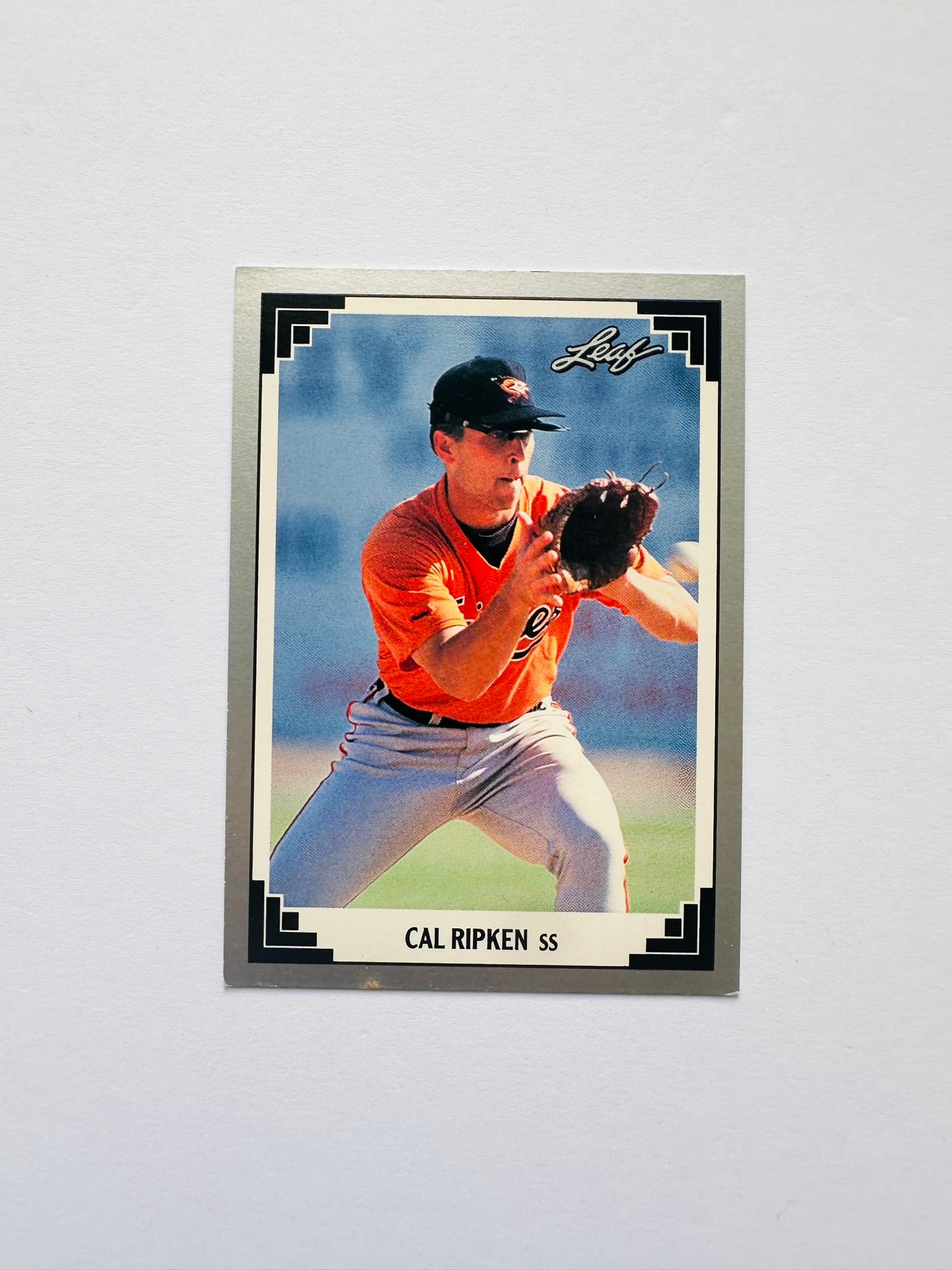 Cal Ripken Jr. 1991 Leaf #430: 1991 Leaf base card featuring Hall of Fame shortstop Cal Ripken Jr. during his consecutive games streak era.