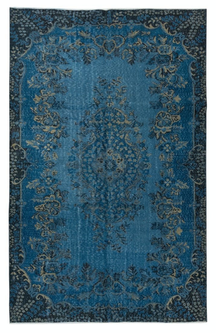 Blue Turkish Hand-Knotted Overdyed Floral Medallion Area Rug TEK1767: Blue over-dyed Turkish area rug with a floral medallion design, ornate border, and softly distressed surface. The color palette includes deep navy, teal, soft gray, and muted beige accents. Hand-knott