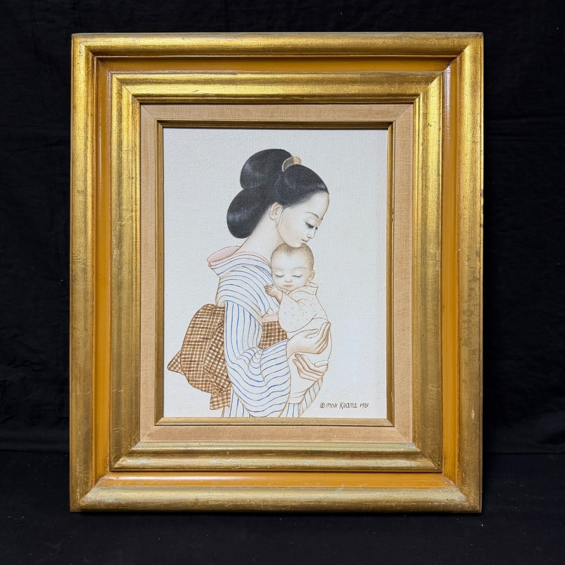 Margaret Keane Mother with Child 1981 Framed Artwork: Framed artwork titled "Mother with Child," dated 1981, depicting a mother holding a sleeping infant in a serene Asian-inspired composition. The lower-right inscription reads "© MDH Keane 1981." Prese