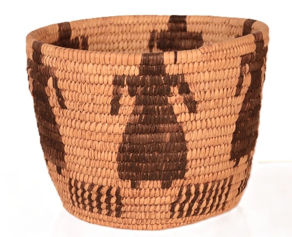 Antique Papago Pictorial Basket, ca. 1920s-1930s, 5.5 in H: Antique Papago pictorial basket dating to circa the 1920s-1930s. Hand-coiled construction with a golden-tan field and dark brown female figure motifs, along with geometric accents. Measures approximat