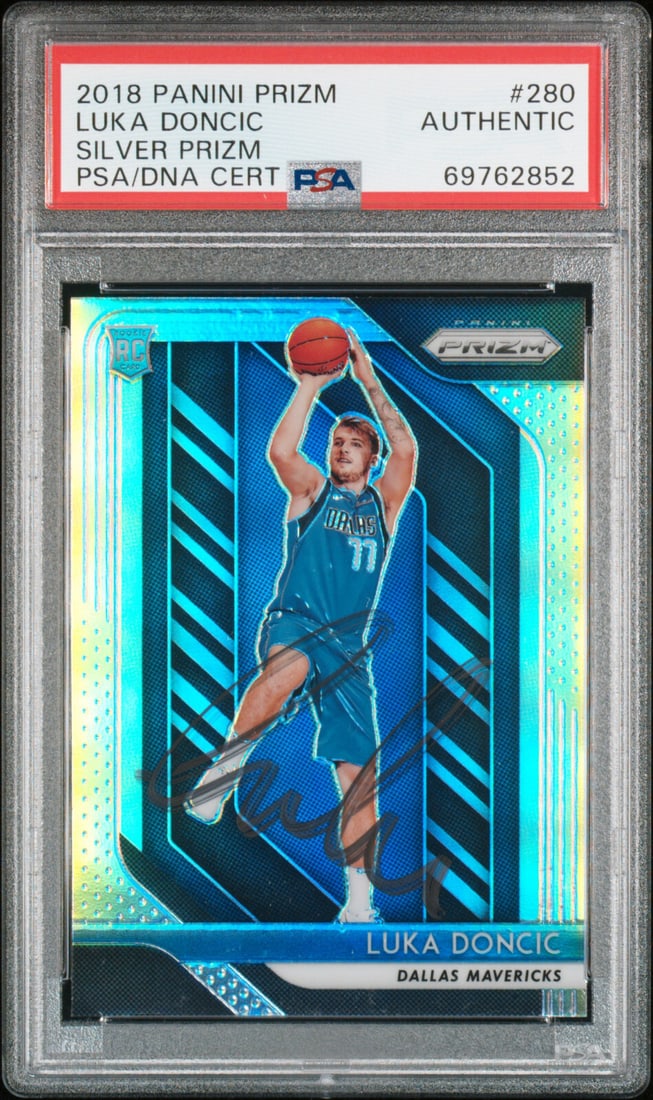 Luka Doncic 2018-19 Panini Prizm Silver Rookie #280 Signed PSA/DNA: 2018-19 Panini Prizm Silver rookie card #280 of Luka Doncic bearing an autograph and presented in a PSA/DNA authentication holder as shown. Please review the photographs for the certification