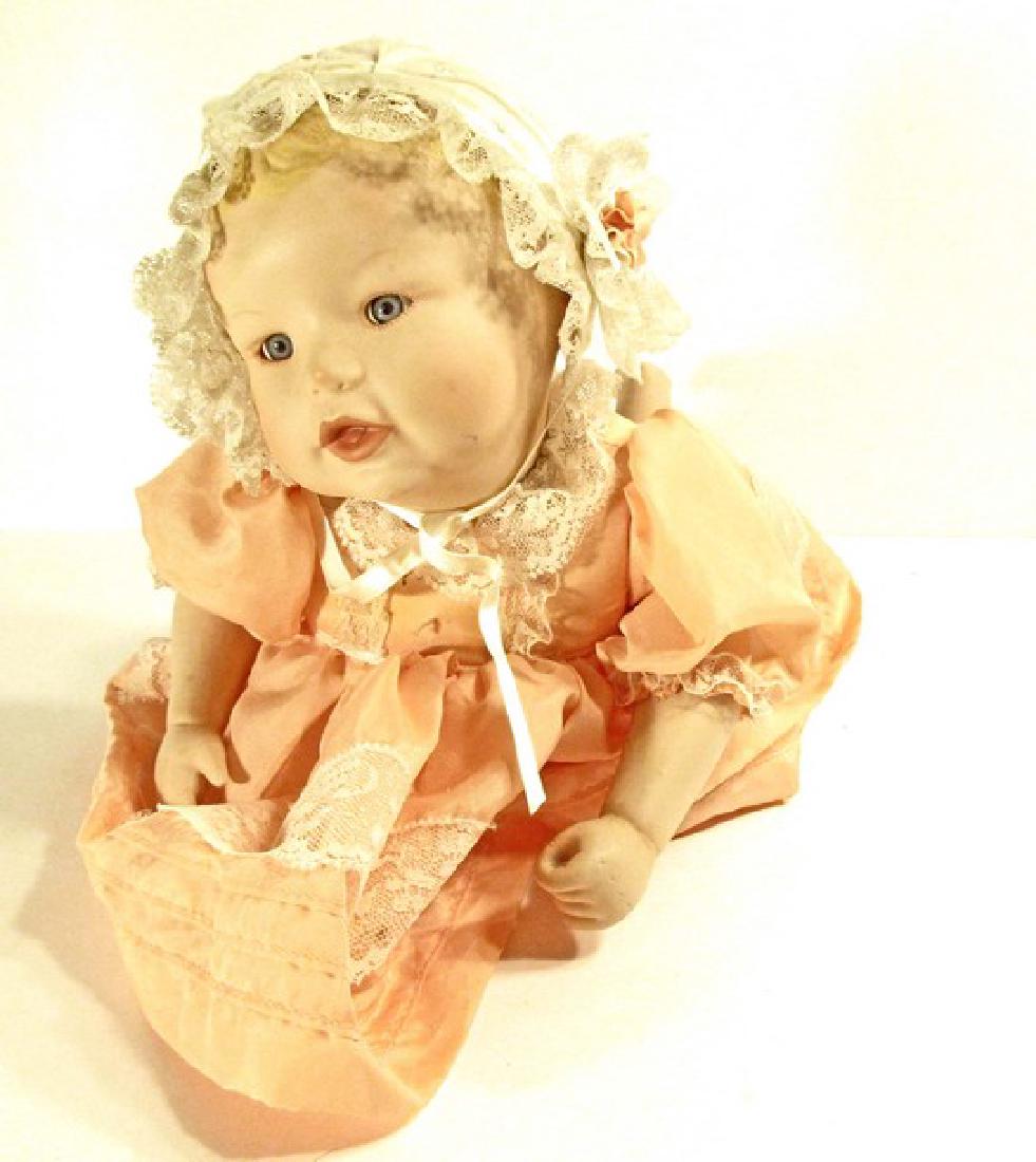 VINTAGE PORCELAIN BABY DOLL - PIANO BABY: 12" long.