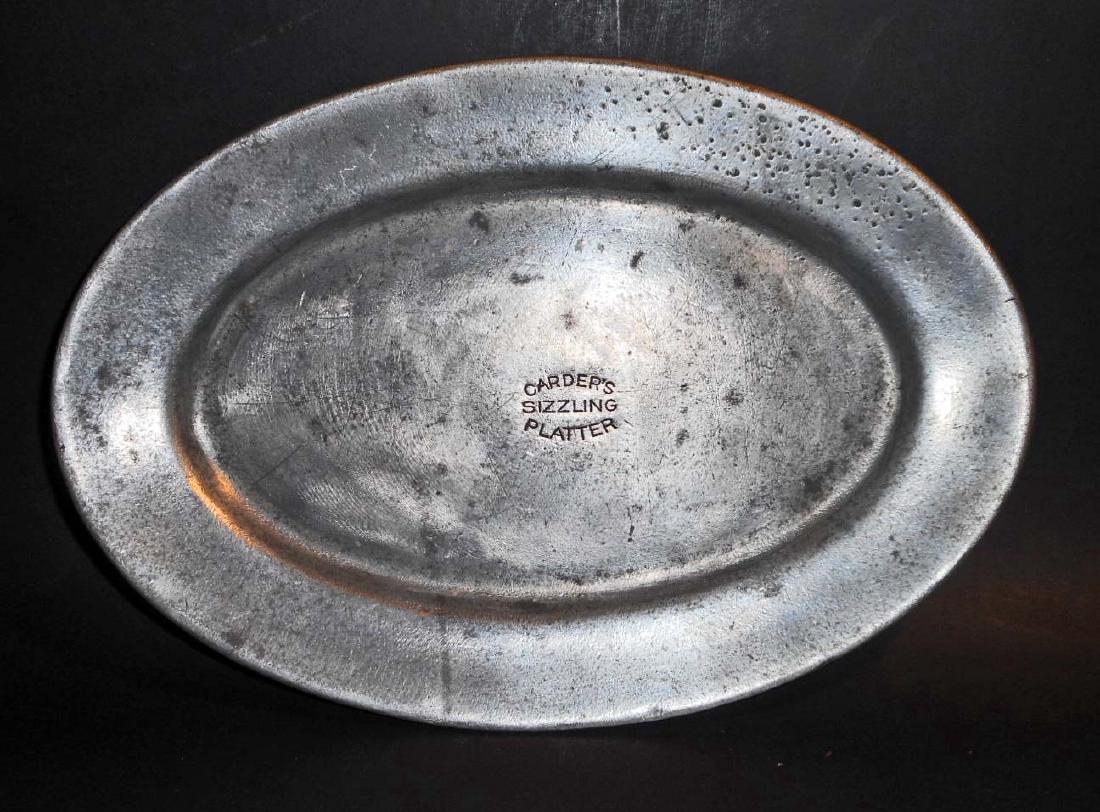 VINTAGE WAGNER WARE ADVERTISING SIZZLING STEAK PLATTER: Approx. 10" by 7". Back is marked Wagner Ware Sidney -O- Al. Carder Sizzling Steak Platter Trade Mark Reg. 333