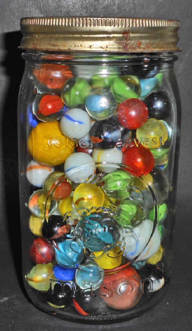 LARGE JAR FULL OF VINTAGE MARBLES: N/A