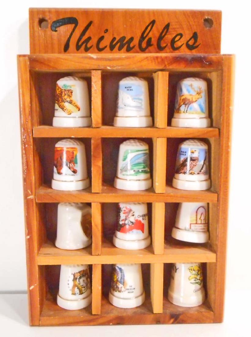 LOT OF 12 VINTAGE PORCELAIN THIMBLES IN WOODEN DISPLAY (1 of 1)