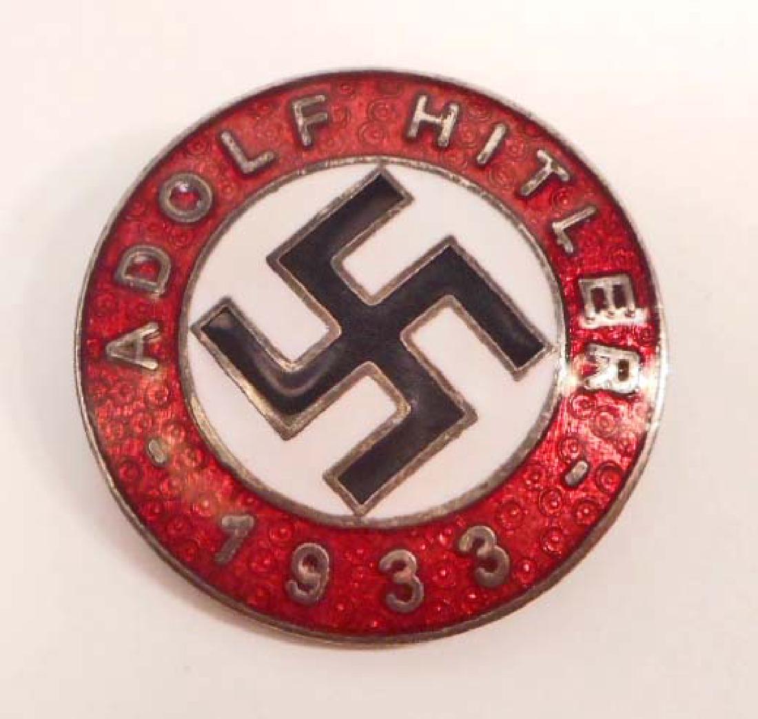 GERMAN NAZI ADOLF HITLER ENAMELED PARTY BADGE: Measures 15/16" in diameter. Maker marked 'RZM M1/129'. Pin back. Nickel construction with enamel.