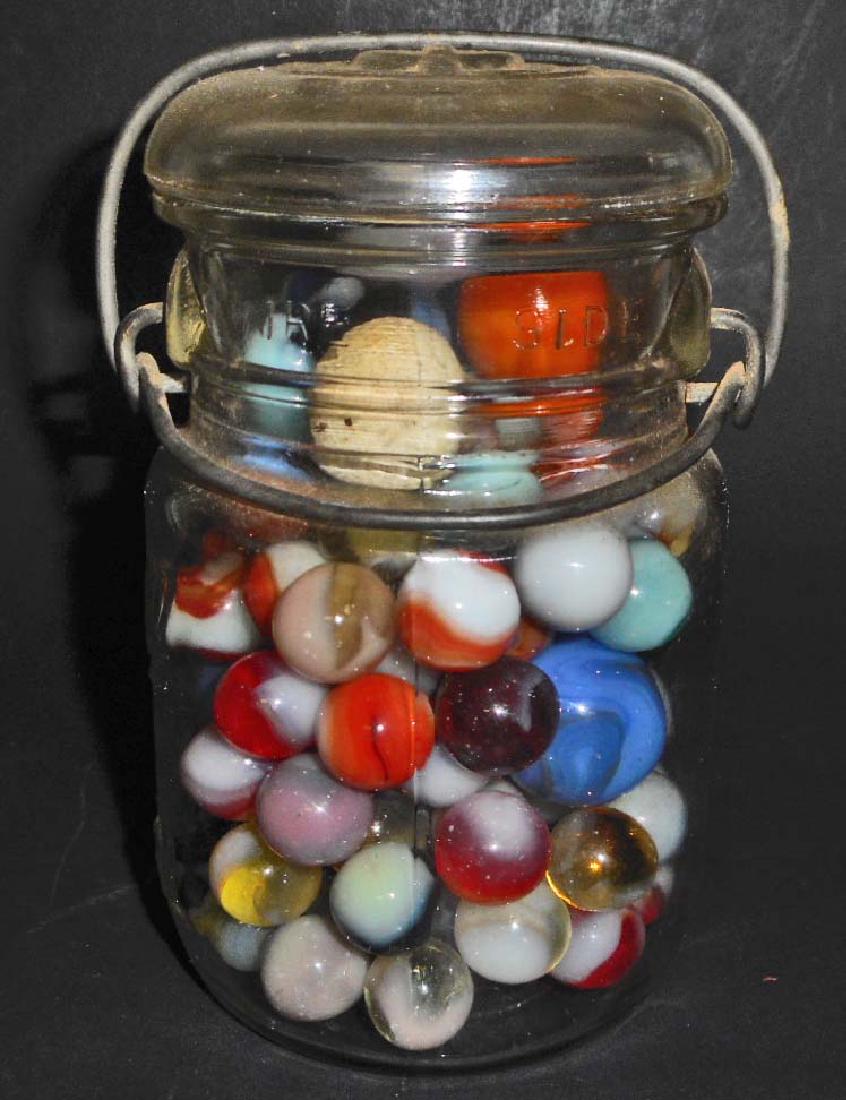 JAR OF VINTAGE MARBLES - INCL. LARGE SHOOTERS: N/A