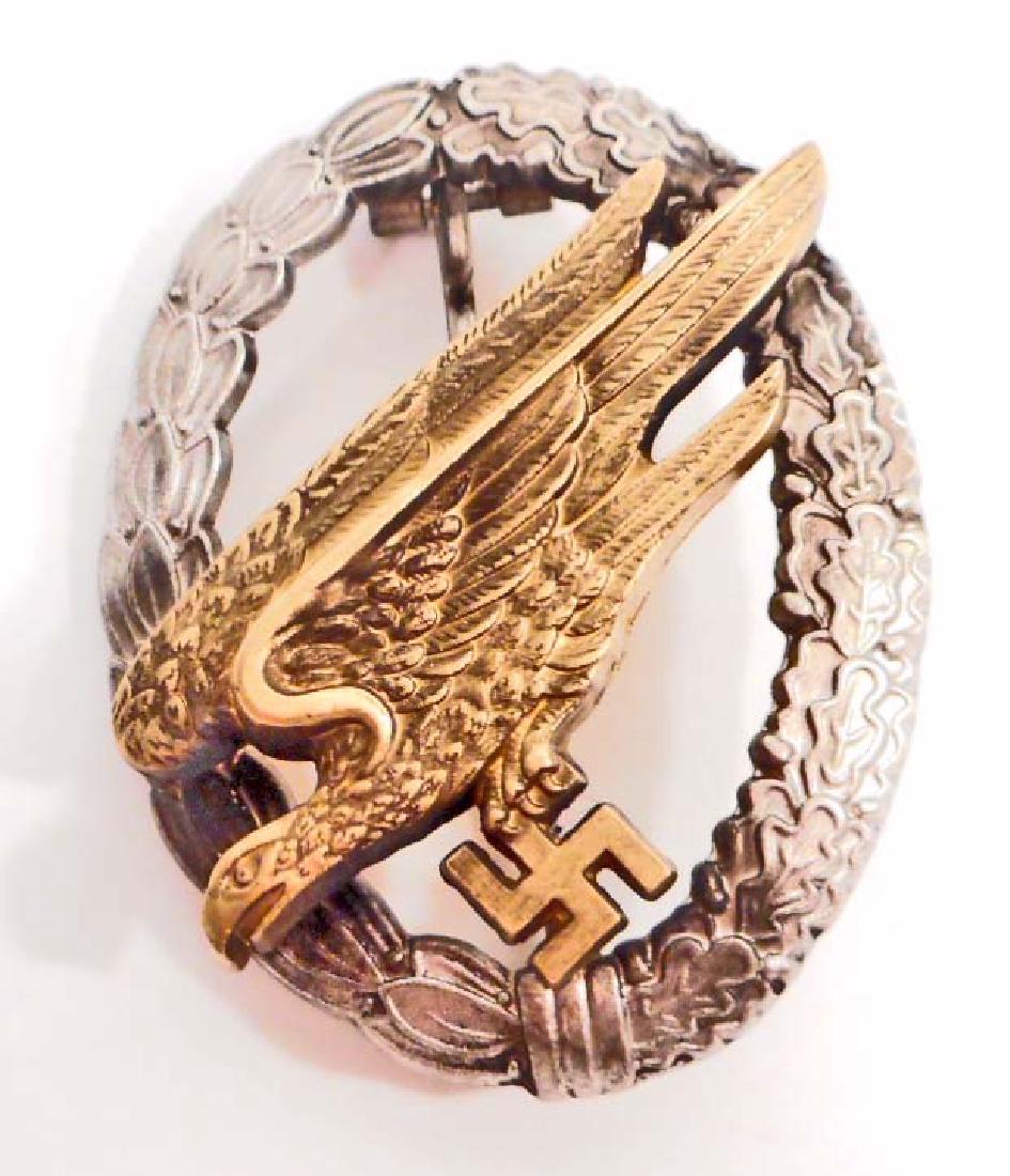 GERMAN NAZI LUFTWAFFE PARATROOPER FALLSCHIRMJAGER JUMP: Maker marked 'B & N L'. Has a thin vertical pin back. Two piece Two (2) domed rivet brass and nickel construction.