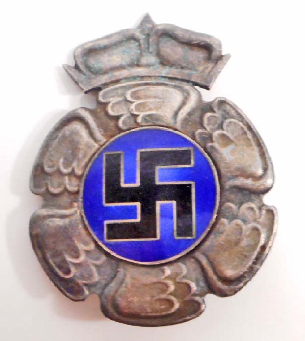 GERMAN NAZI FINLAND LUFTWAFFE AXIS PILOT BADGE: Measures 1 11/16" wide by 2 1/16" tall. Has a thin vertical pin back with a lock-ing device. Two piece nickel construction with enamel.