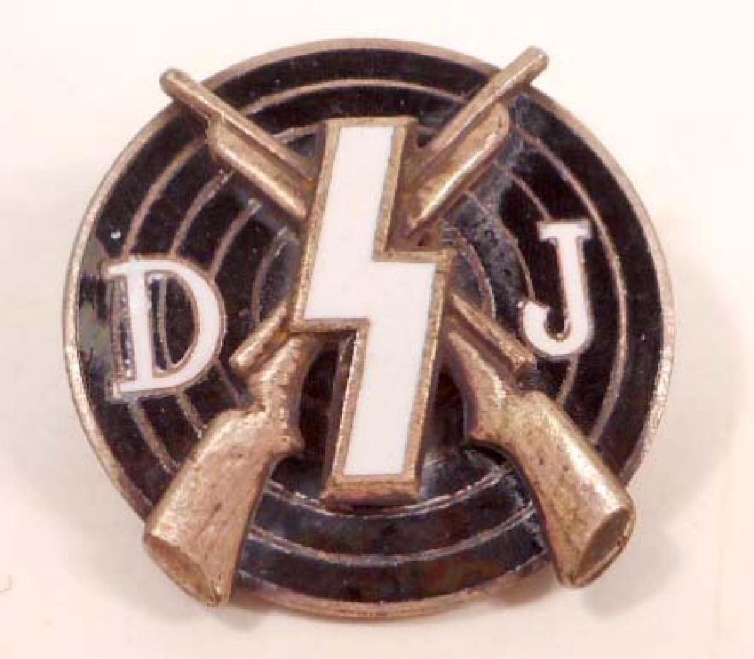 GERMAN NAZI DEUTSCHES YOUTH DJ MARKSMAN SHOOTING AWARD: Measures 13/16" in diameter. The reverse side is maker marked 'RZM M1/123'. Has a thin horizontal pin back. Two piece brass construction with enamel.