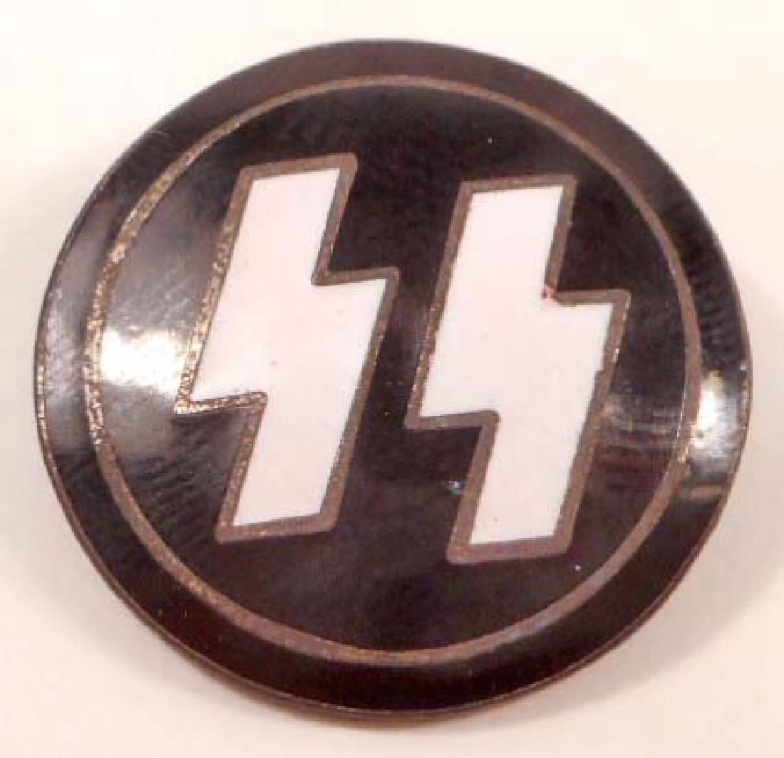 GERMAN NAZI WAFFEN SS PARTY MEMBER LAPEL BADGE: Measures 7/8" in diameter. The reverse side is maker marked 'RZM M1/4 ges gesch'. Has a thin horizontal pin back. Nickel construction with enamel.