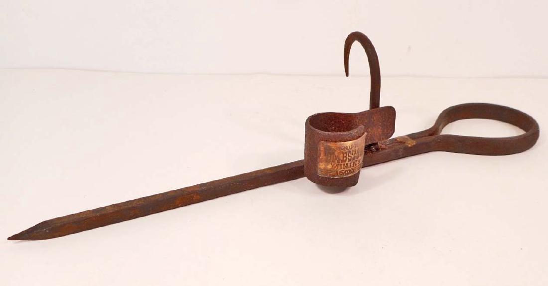 CAST IRON TOMBSTONE MINER'S CANDLESTICK: N/A