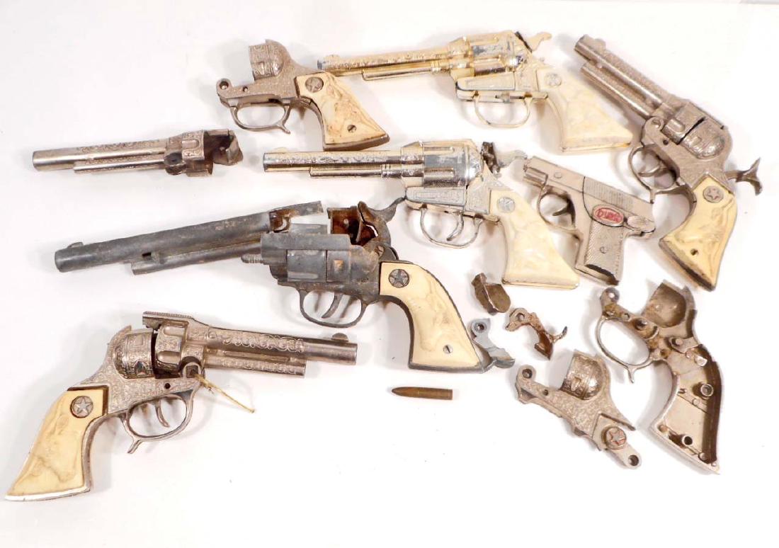 LARGE LOT OF VINTAGE TOY COWBOY CAP GUNS FOR PARTS: Large lot of Cap Guns for Parts or Repair. Texan JR, Ranger, Dick, etc.