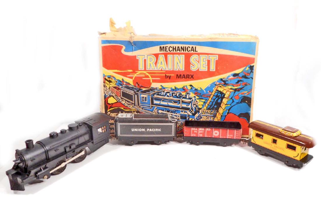 VINTAGE MARX MECHANICAL TRAIN SET IN ORIGINAL BOX: Marx tin litho train cars, Locomotive and key in original box.