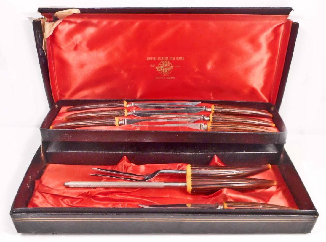 VINTAGE E. PARKER SHEFFIELD KNIFE SET IN ORIGINAL CASE: 5 knives w/ Westinghouse Sheffeld England marked on blade, 2 knives marked USA. Also includes meat fork and knife sharpener.