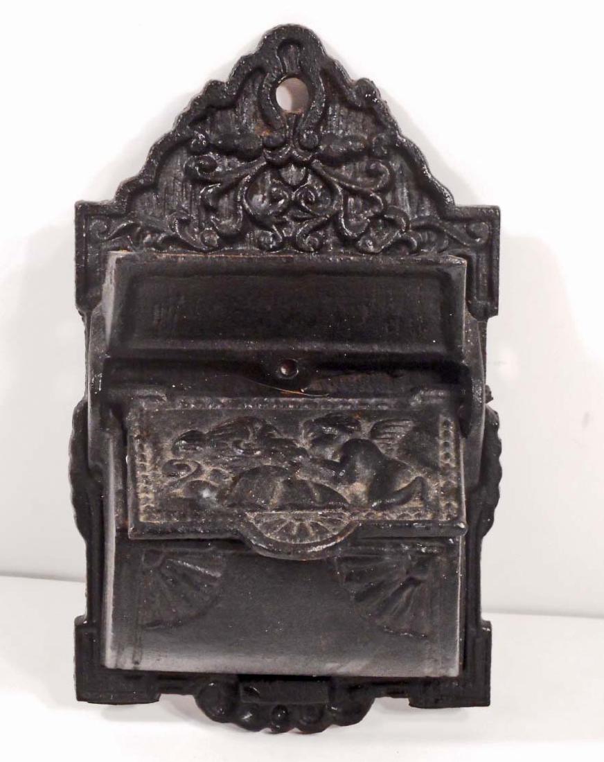 VINTAGE CAST IRON MATCH HOLDER