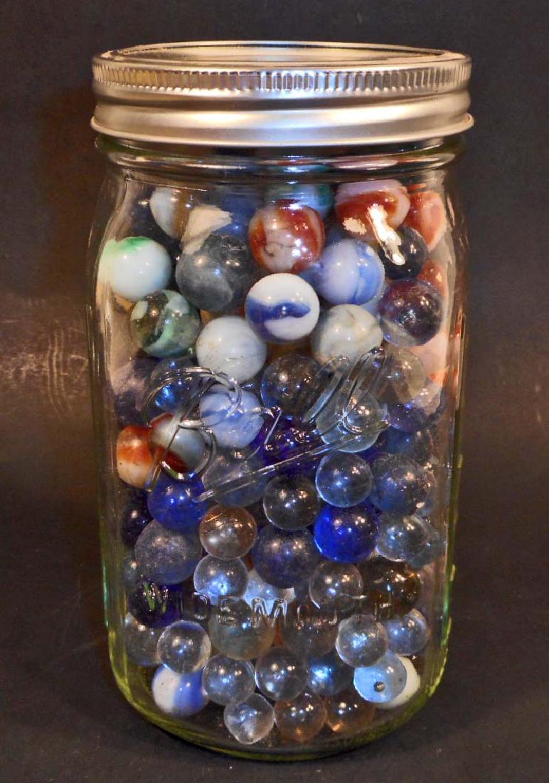 LARGE JAR OF VINTAGE MARBLES - INCLUDING SHOOTERS: N/A