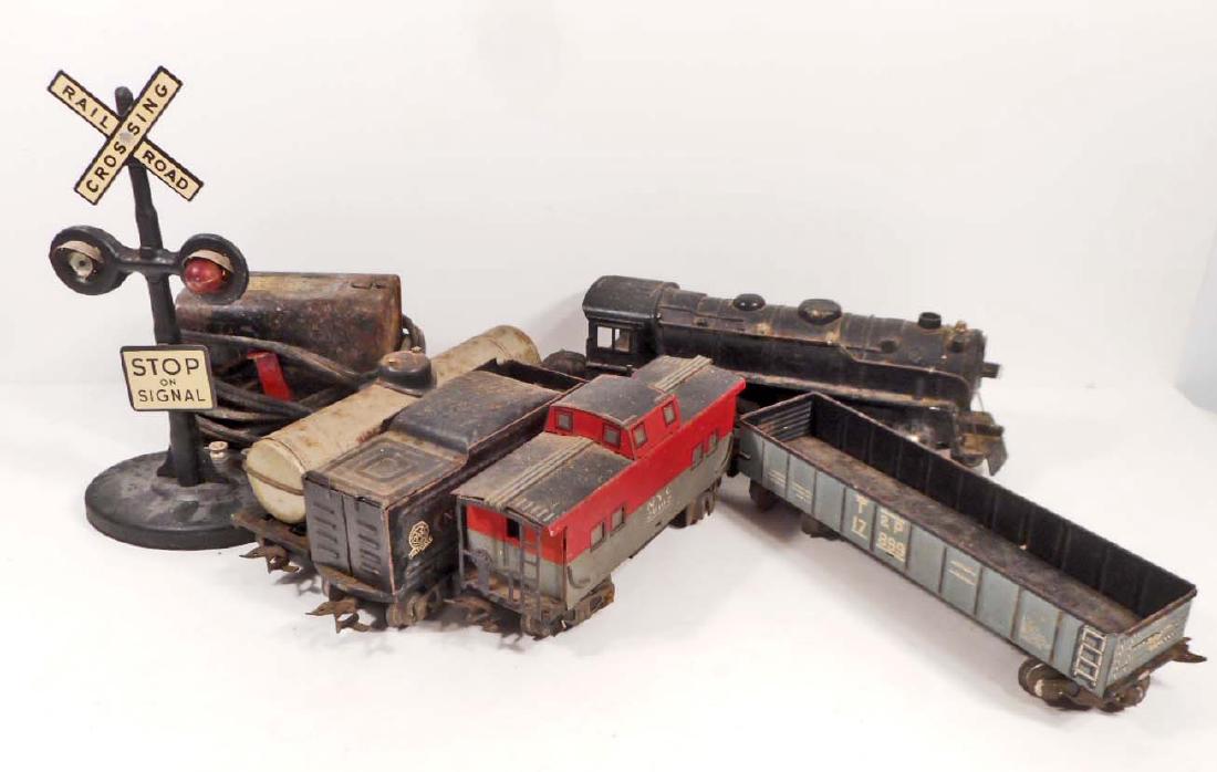 VINTAGE MARX TIN LITHO TRAIN SET W/ ENGINE &: Engine, coal tender, 2 train cars and caboose along with transformer and crossing sign