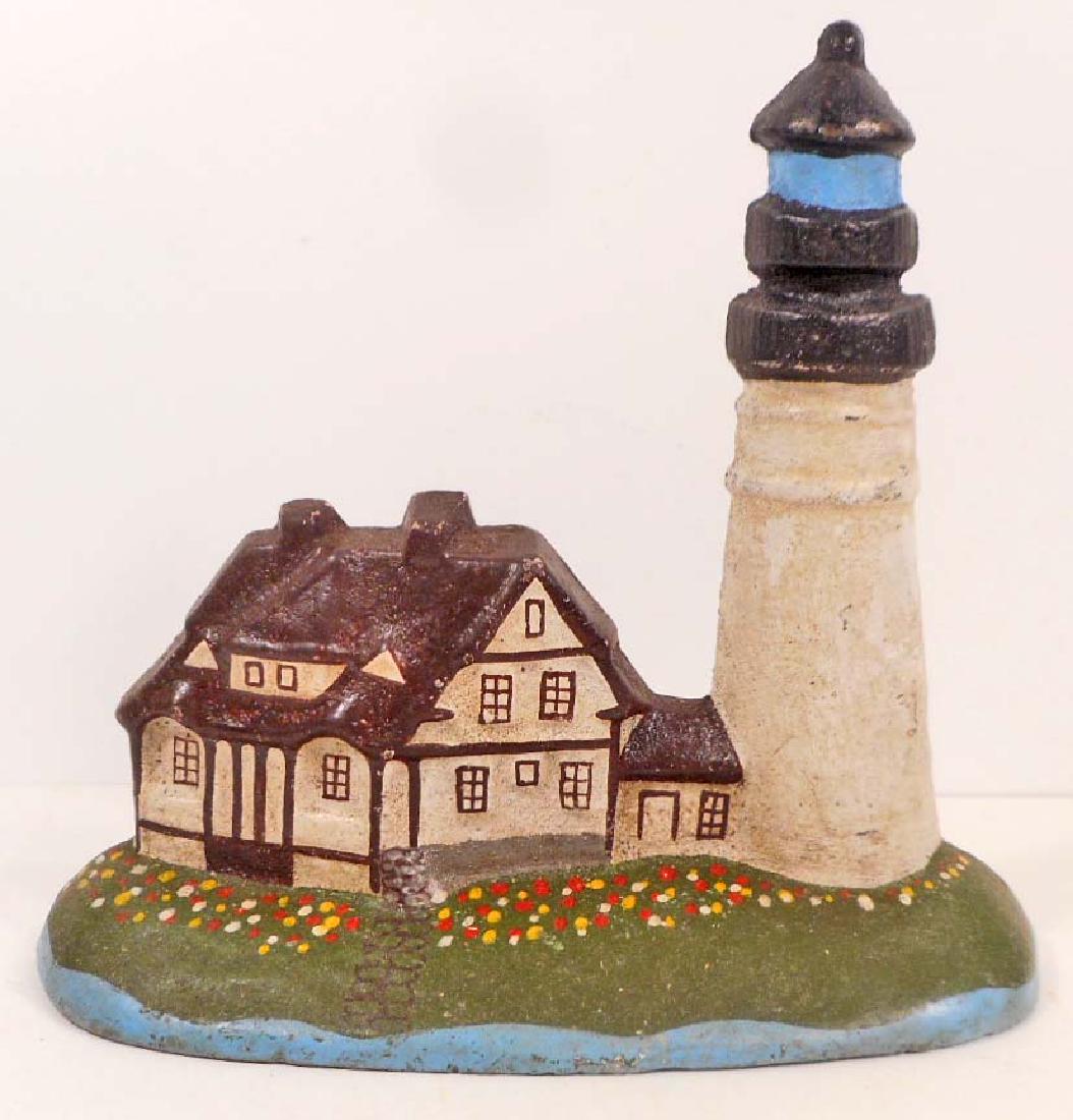 CAST IRON LIGHTHOUSE DOORSTOP: 7" tall