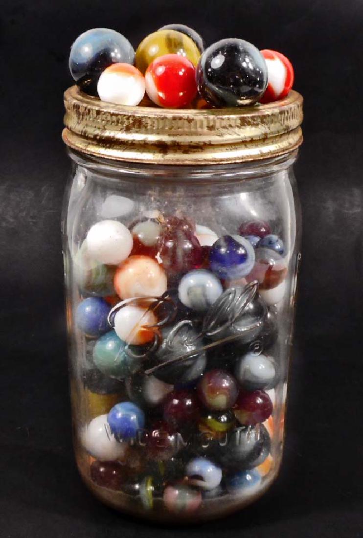 LARGE JAR OF VINTAGE MARBLES INCLUDING SHOOTERS: n/a
