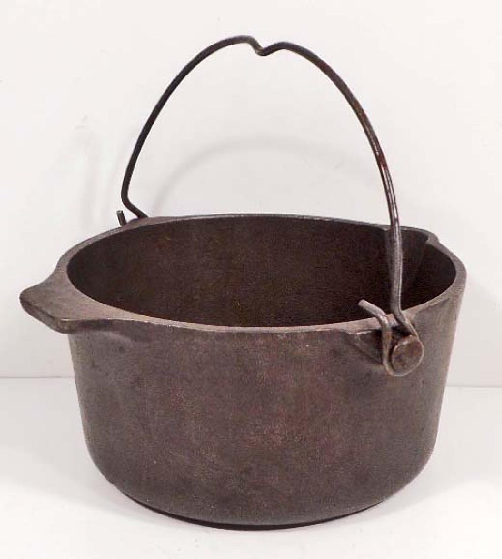 ANTIQUE GRISWOLD IRON DEEP PATTY BOWL 72 W/ HANDLE: 5" diameter by 2.5" tall. Marked on the bottom.