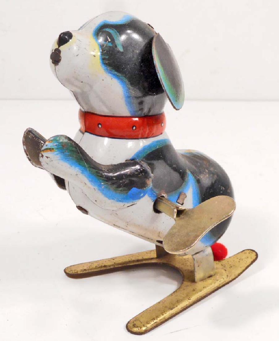 VINTAGE TIN LITHO WIND-UP HOPPING DOG TOY: 5" tall