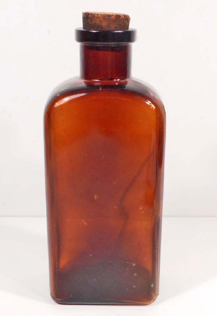 VINTAGE BROWN AMBER GLASS PHARMACY BOTTLE W/ CORK TOP: 9" tall