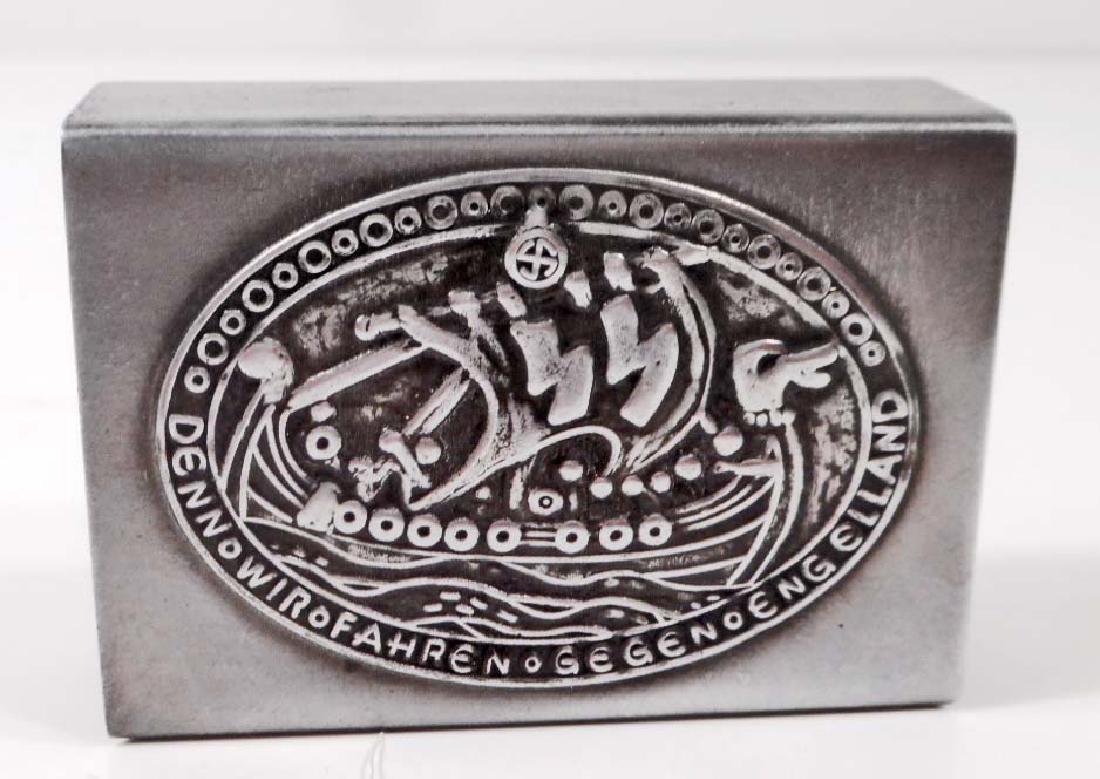 GERMAN NAZI WAFFEN SS VICTORY IN ENGLAND MATCH HOLDER: Measures 2 1/8" wide by 1 1/2" tall by 11/16" deep. The front shows a Viking ship with a pair of Waffen SS runics in the sail. This was manufactured a bit premature. Stamped steel construction