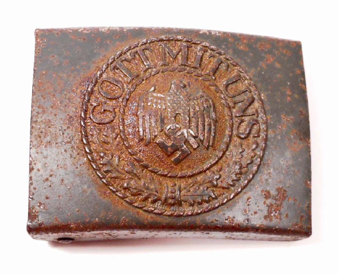 GERMAN NAZI ARMY ENLISTED MANS BELT BUCKLE: The front reads 'Gott Mit Uns' and has a German army eagle in the center. Stamped green painted steel construction.