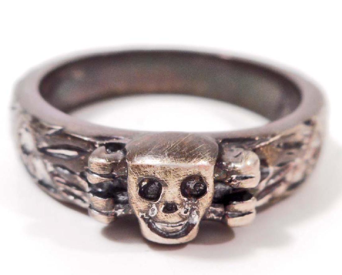 GERMAN NAZI WAFFEN SS SHULTZ STAFFEL OFFICERS RING: The front has a skull in the center. The inside is engraved 'H. Himmler'. It is also marked '925'for the silver content. Measures 3/4" inside diameter.